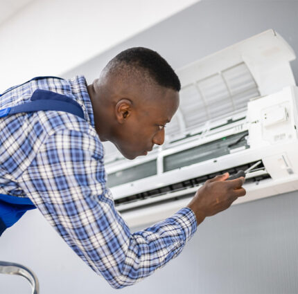 ac-electrician-technician-repairing-air-conditioner